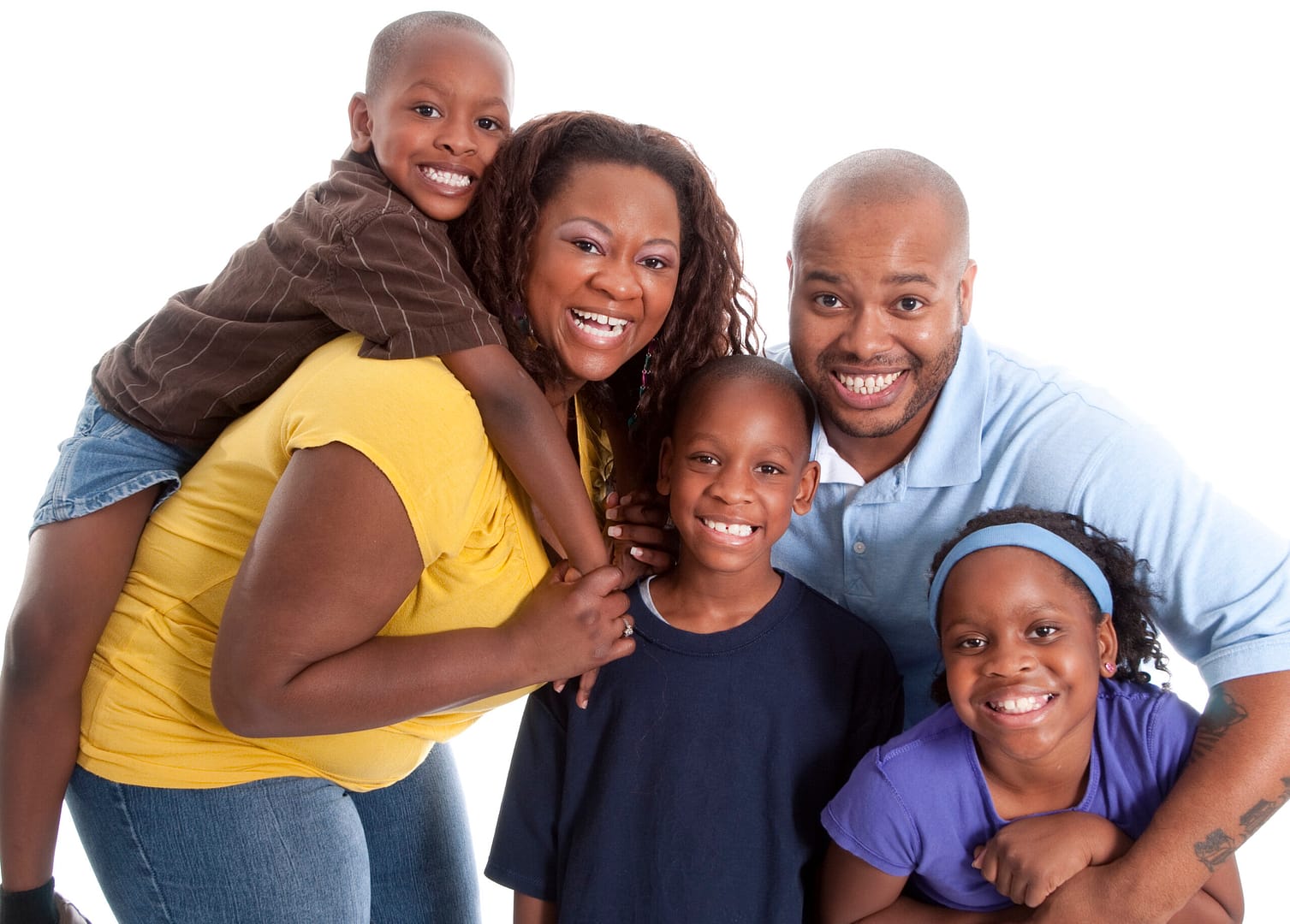 Happy African American family with three young children